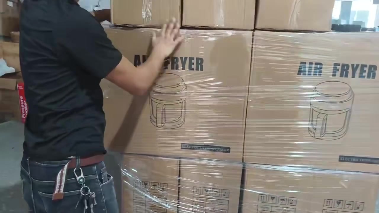 Air fryer cartons handled in a small appliance packing area